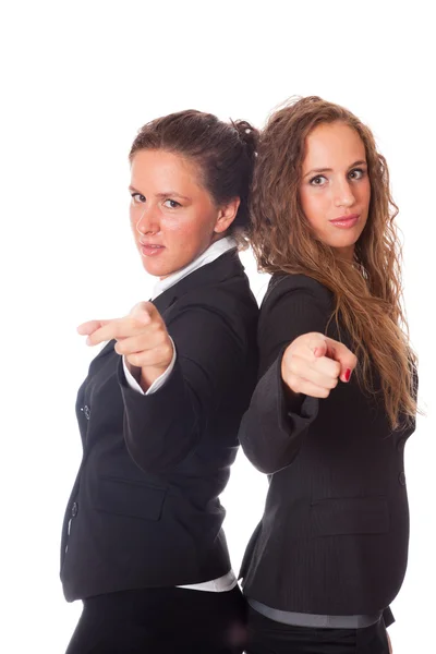 Zwei Geschäftsfrauen zeigen mit dem Finger in die Kamera — Stockfoto
