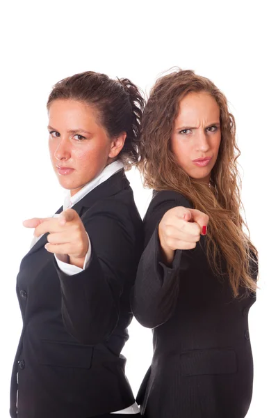 Twee zakelijke vrouwen hun vingers wijzen op camera — Stockfoto