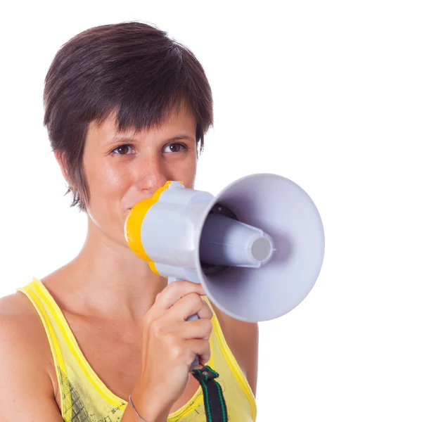 Młoda kobieta rozmawia przez megafon — Zdjęcie stockowe