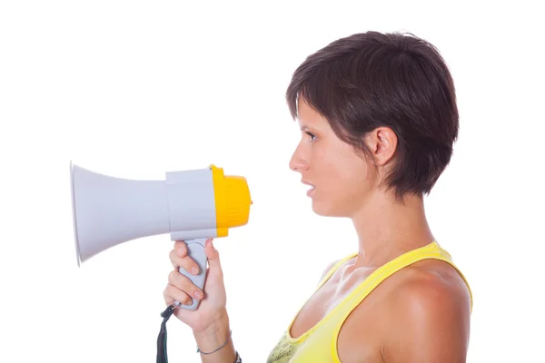 Młoda kobieta rozmawia przez megafon — Zdjęcie stockowe