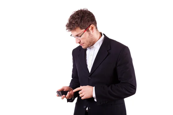 Молодой бизнесмен со смартфоном — стоковое фото