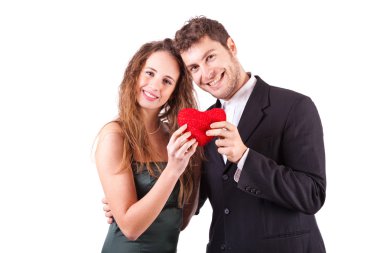 Couple Holding an Heart, symbol of Love, on Valentine's Day clipart