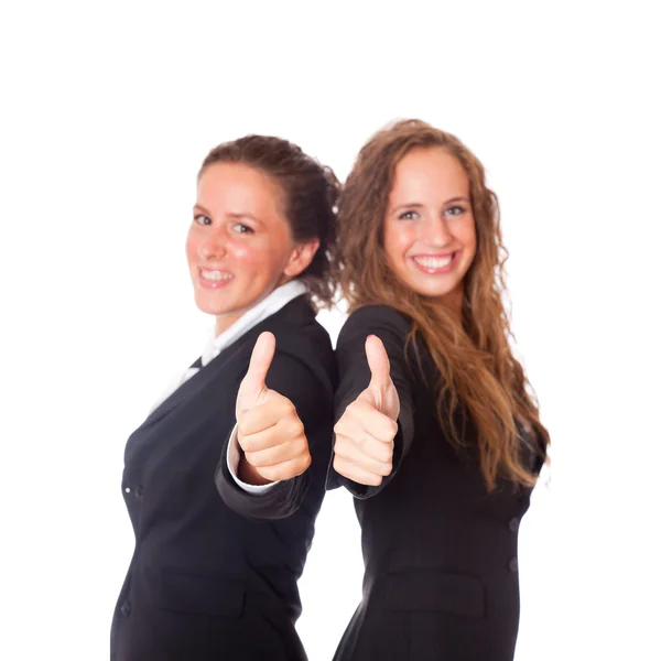 Dos mujeres de negocios con pulgares hacia arriba — Foto de Stock