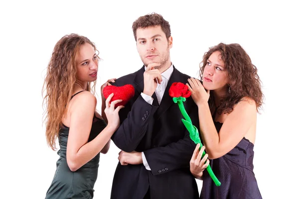 Handsome Man with two Women Flirting Royalty Free Stock Images