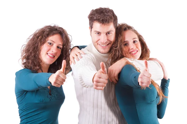 Три счастливых друга с поднятыми пальцами — стоковое фото