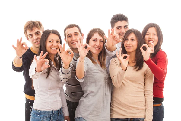 Mutlu çok ırklı grup ok işareti gösteriliyor — Stok fotoğraf