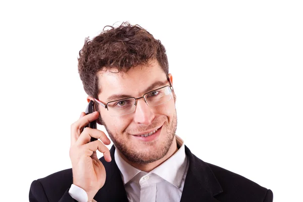Молодой бизнесмен со смартфоном на белом — стоковое фото