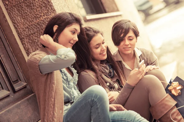 Group of Women Sending Message with Mobile Phone Royalty Free Stock Images