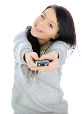 Girl and a remote control. clipart