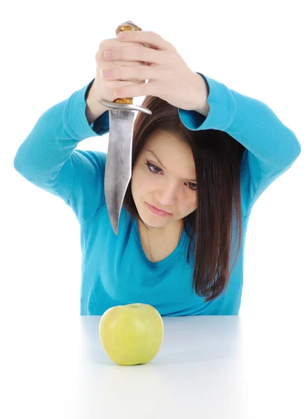 La chica enojada y una fruta . — Foto de Stock