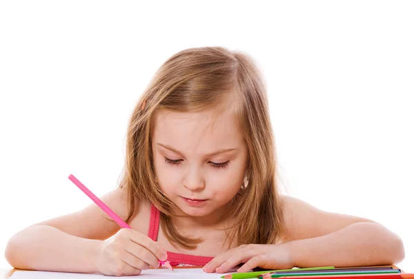 Pieni tyttö kirjoittaa — kuvapankkivalokuva