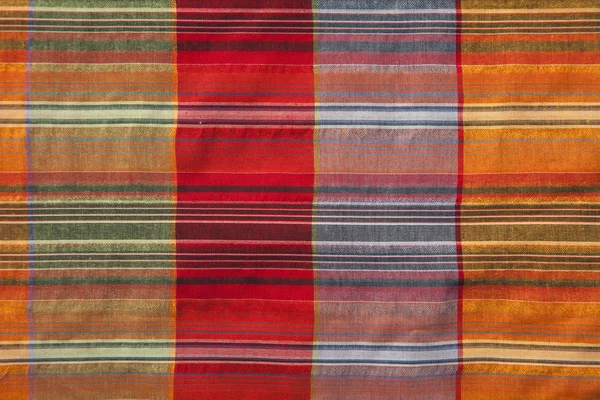 Multicoloured fabric with geometric pattern — Stock Photo, Image