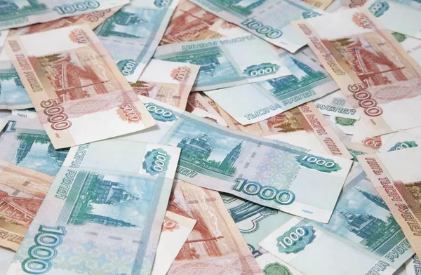 Sfondo di uno e cinquemila rubli russi fatture — Foto Stock