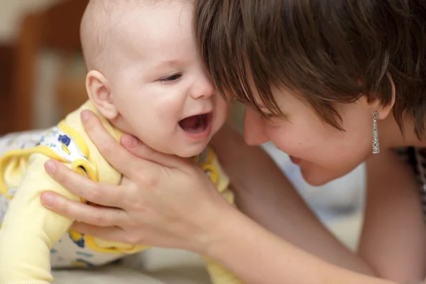 Happy baby boy with his mother — Stock Photo, Image