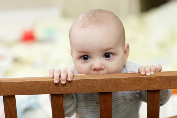 Baby biting cot — Stock Photo, Image