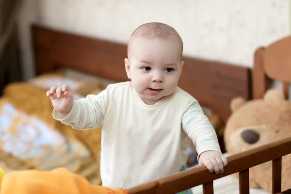 Kid in cot — Stock Photo, Image