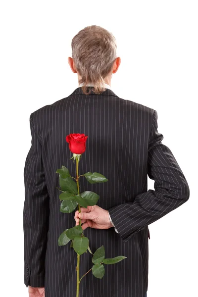 Άνθρωπος με κόκκινο τριαντάφυλλο — Φωτογραφία Αρχείου