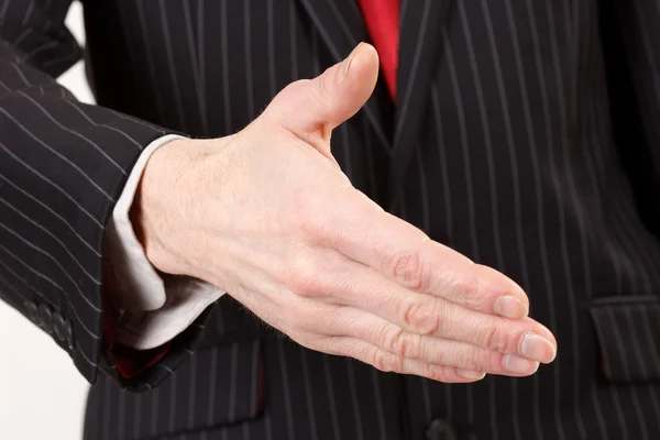 Üzletember egy nyitott kéz — Stock Fotó