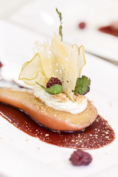 Poached pear with red wine and spice — Stock Photo, Image