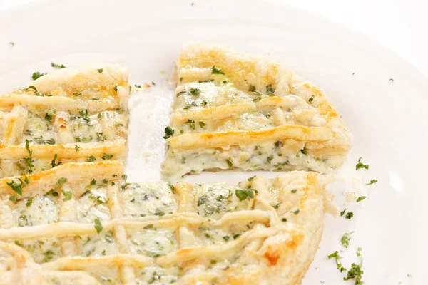 Tasty quiche with cheese and herbs — Stock Photo, Image