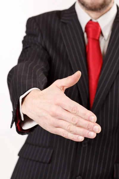Üzletember egy nyitott kéz — Stock Fotó