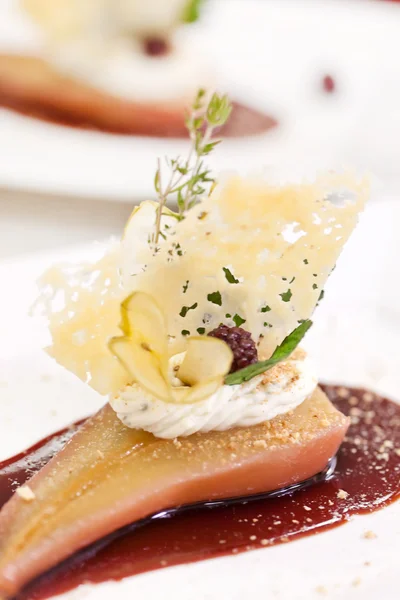 stock image Poached pear with red wine and spice