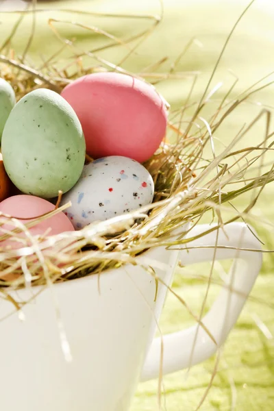 Easter chocolate eggs in the nest — Stock Photo, Image