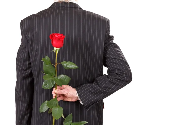 Άνθρωπος με κόκκινο τριαντάφυλλο — Φωτογραφία Αρχείου