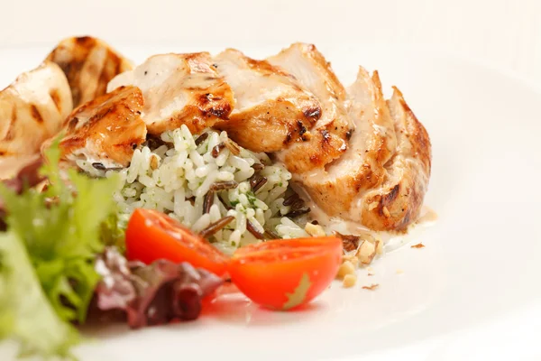 Chicken fillet with vegetables and rice — Stock Photo, Image