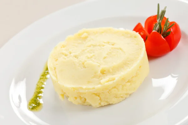 Mashed potato with tomato — Stock Photo, Image