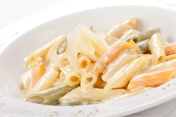 Tasty pasta with cream and cheese — Stock Photo, Image