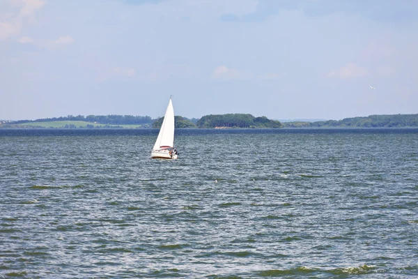 stock image White yacht in blue sea