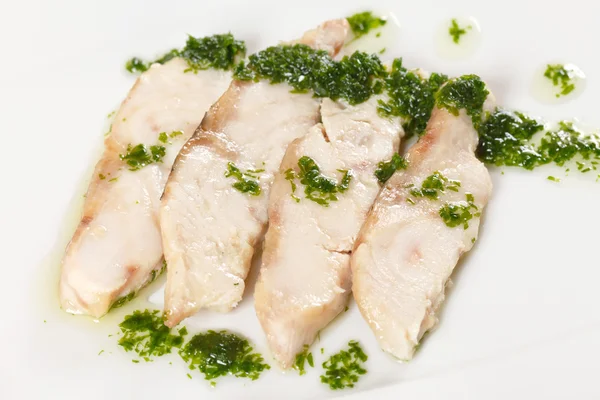 stock image Sturgeon with spinach sauce