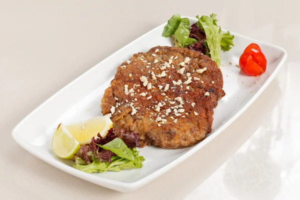 stock image Grilled steak meat with salad