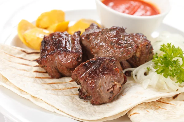 Fried meat with sauce — Stock Photo, Image