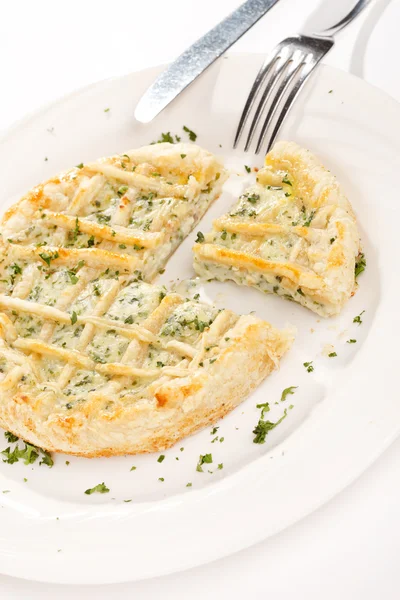 Tasty quiche with cheese and herbs — Stock Photo, Image