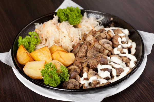 stock image Meat with potatoes in the pot