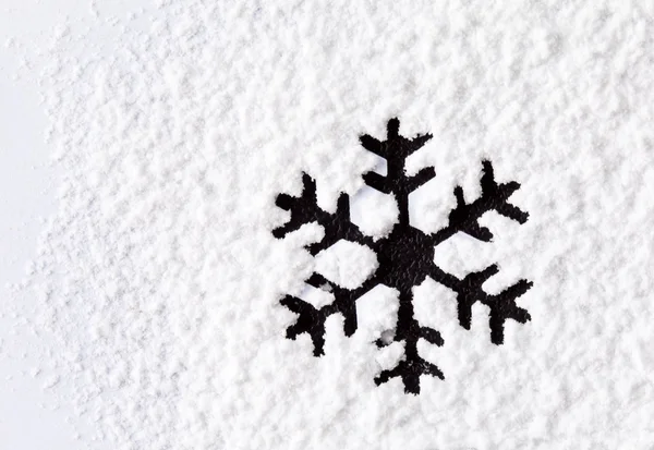 Snowflake on the snow — Stock Photo, Image