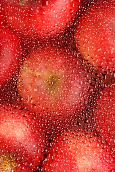 Pozadí s čerstvými červenými jablky — Stock fotografie