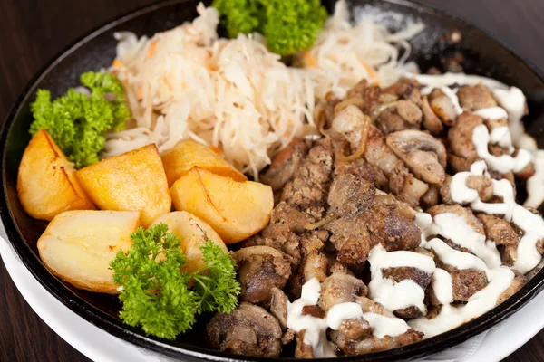 stock image Meat with potatoes in the pot