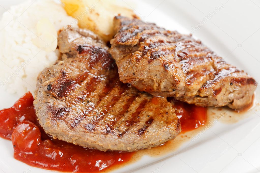 Grilled pork steak with pear