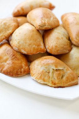 Homemade pasties with potatoes clipart