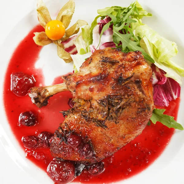 Duck wings with cranberry sauce — Stock Photo, Image