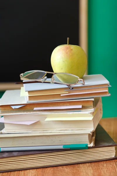 School chalkboard and books — Stock Photo, Image