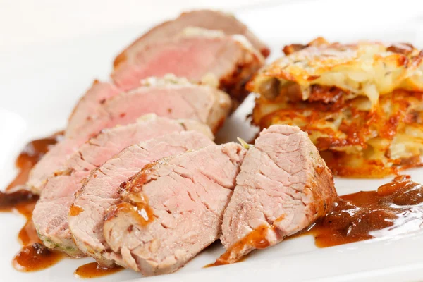 Meat with vegetable pancakes — Stock Photo, Image