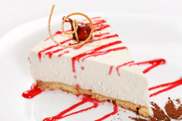 Cheesecake with sauce — Stock Photo, Image
