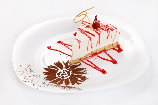 Cheesecake with sauce — Stock Photo, Image