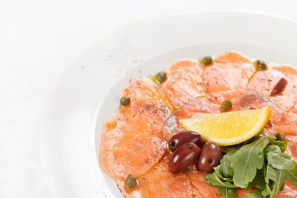 stock image Fish Carpaccio with salad