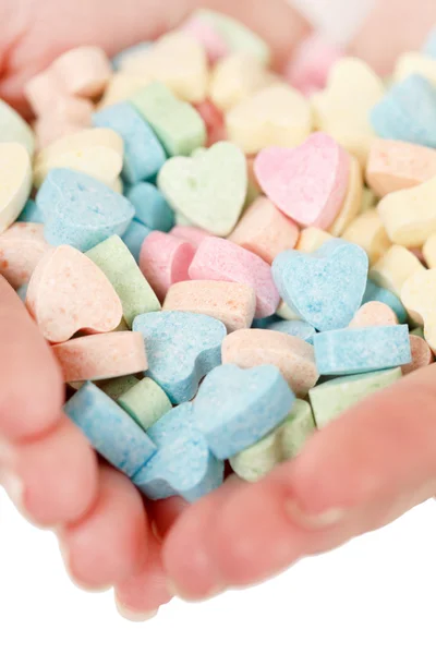 Woman with heart sweets — Stock Photo, Image