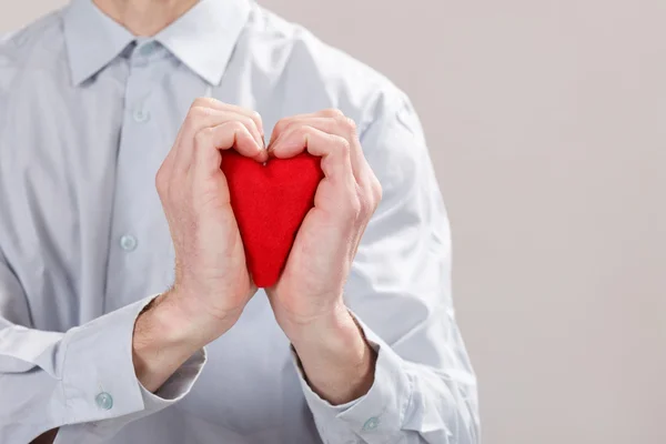 Man with red heart — Stock Photo, Image